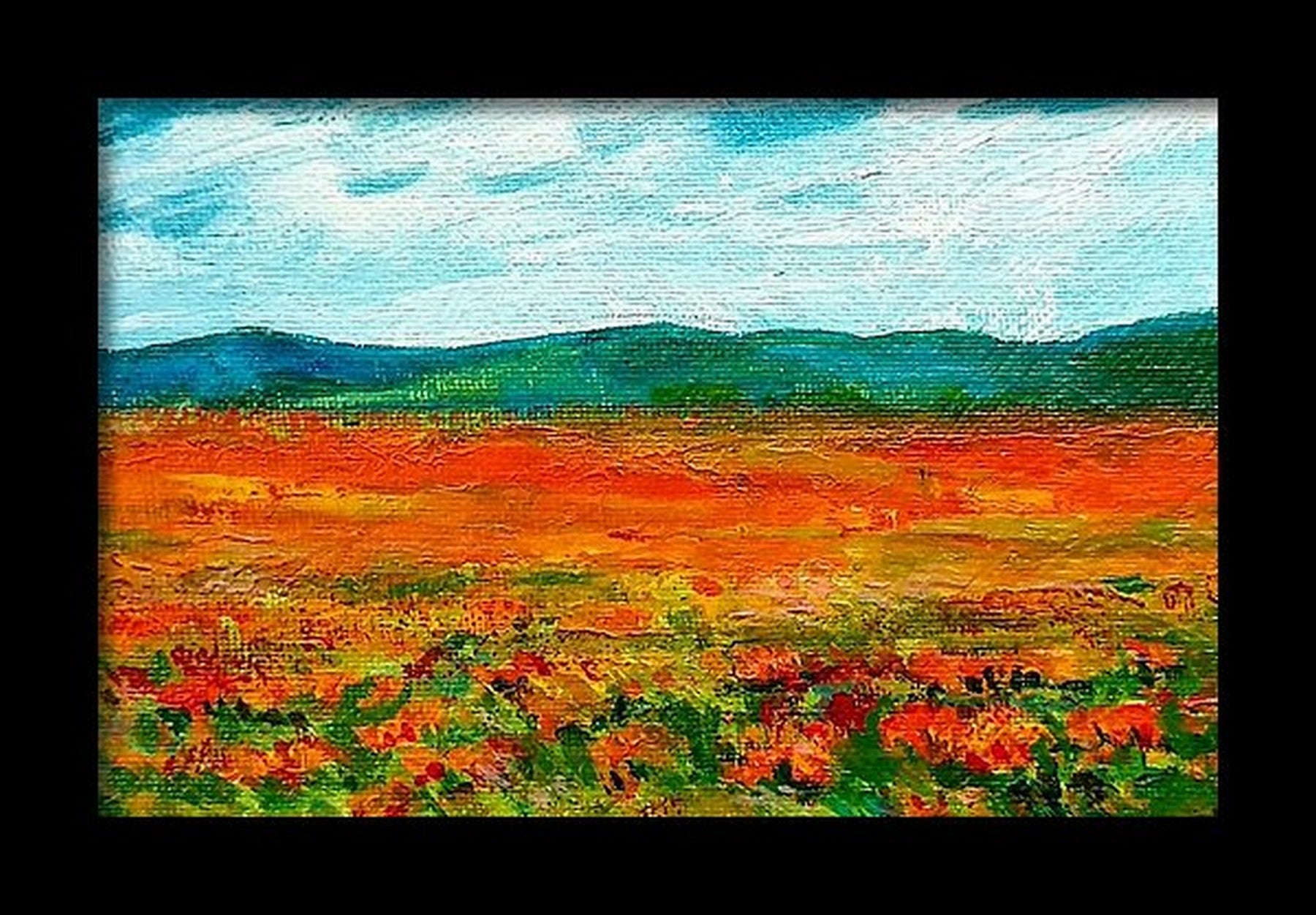 Blue hills and red poppies