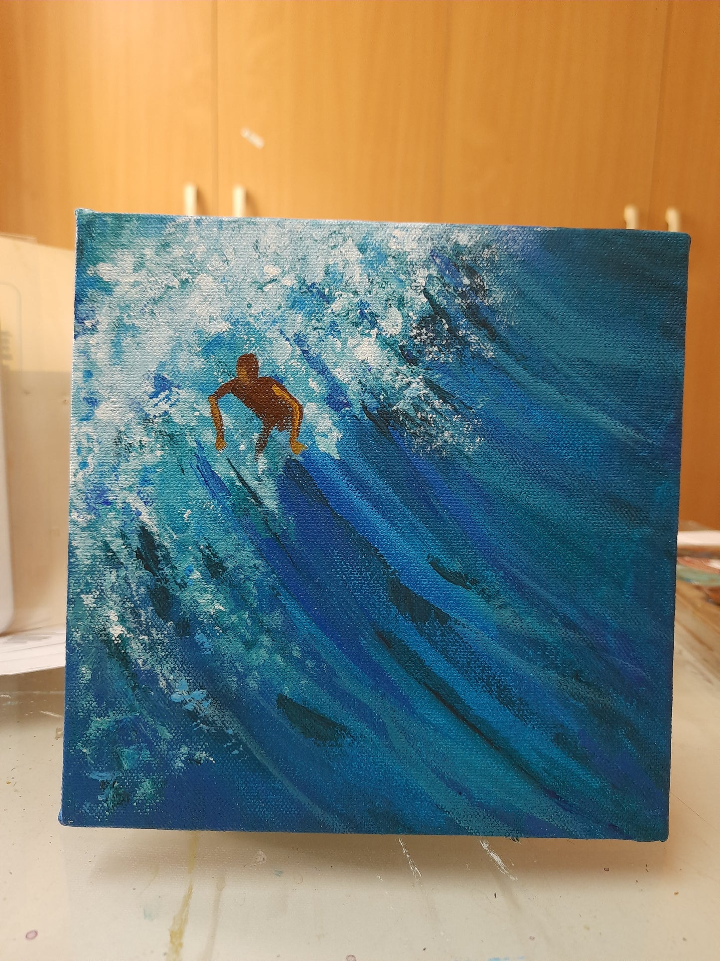 Work in progress surfer riding the ocean waves 