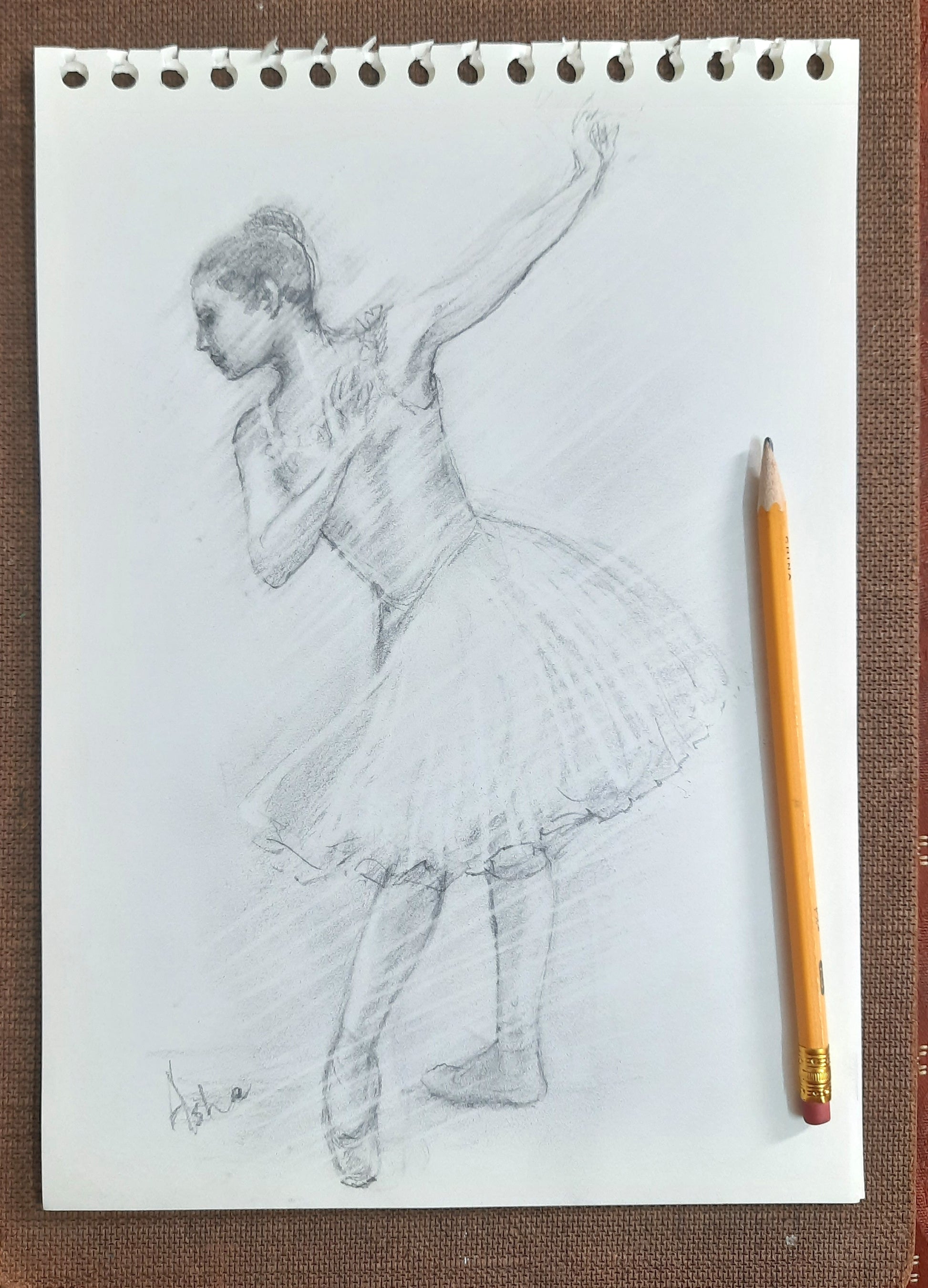 Ballerina pencil drawing in studio