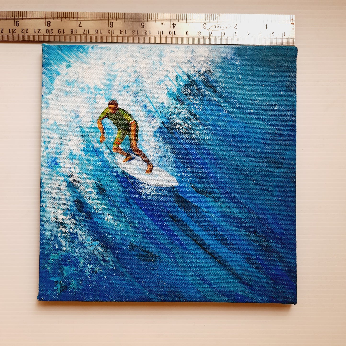 surfer riding the ocean waves, measurement